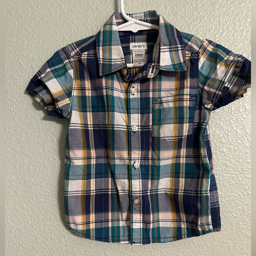 Multi-colored short sleeved button down toddler shirt from Carter’s.